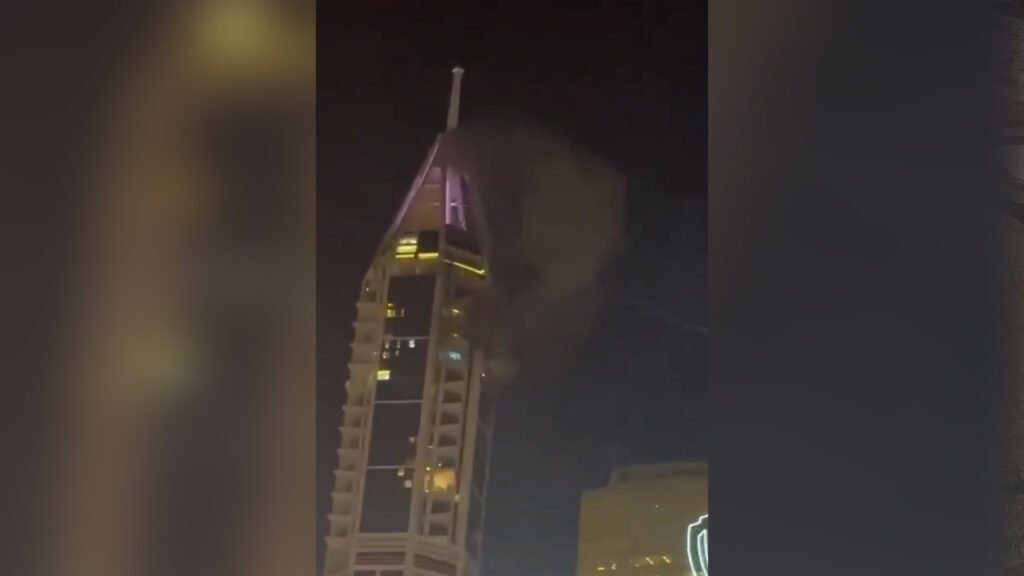 Smoke rises from a Dubai tower after attack | Conflict